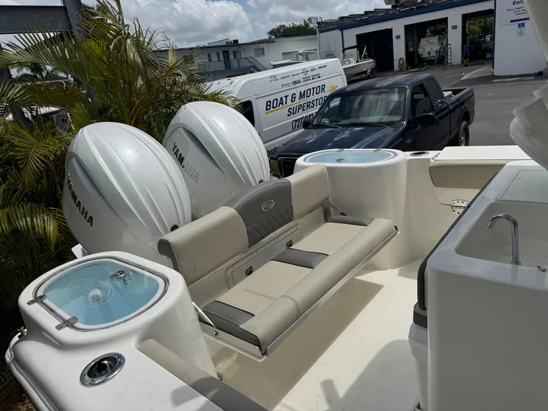 Slide: The Image of 2025 Key West 260 boat interior with Yamaha engines, seating, and live wells. - 31