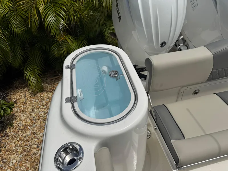 Slide: The Image of 2025 Key West 260 boat with livewell and seating, featuring a sleek design. - 32
