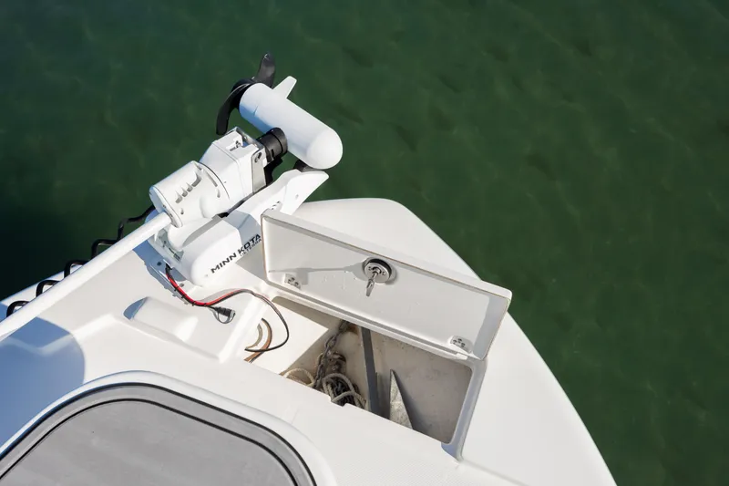 Slide: The Image of 2024 Sea Born FX22 Bay boat bow with anchor storage and trolling motor. - 16