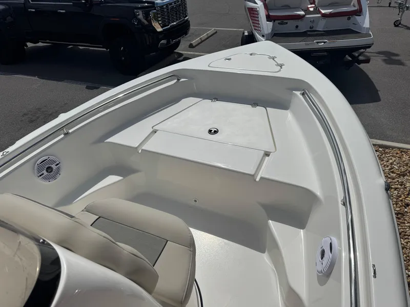 Slide: The Image of 2025 Key West 189 FS boat interior with seating and storage compartments. - 22