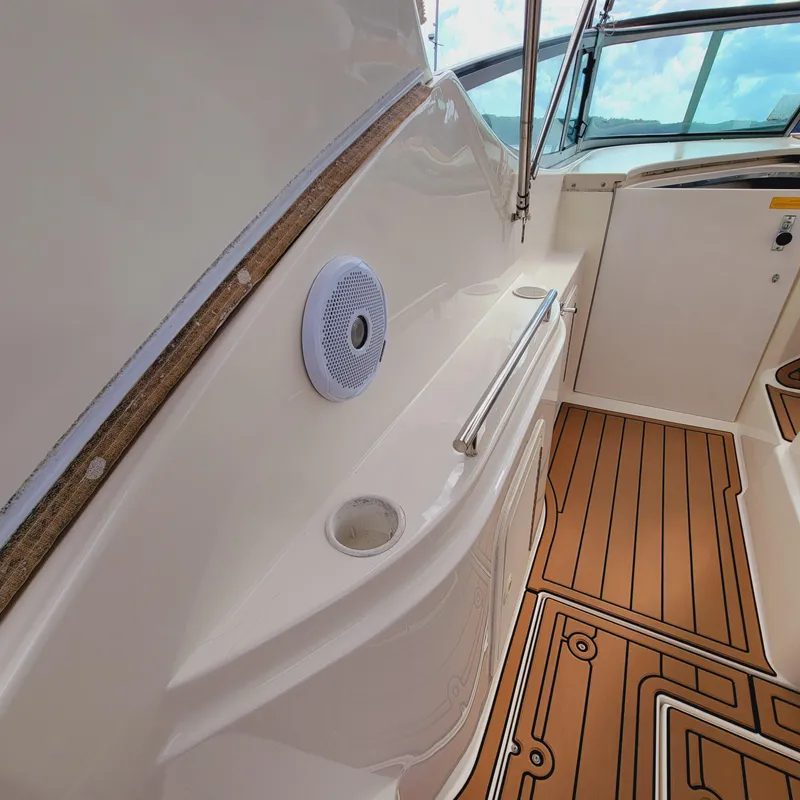Slide: The Image of 1999 Cruisers Yachts 3075 Rogue interior with wood flooring and speaker. - 20
