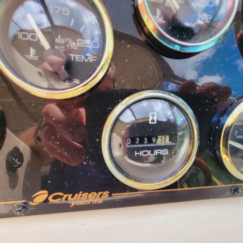 Slide: The Image of Close-up of 1999 Cruisers Yachts 3075 Rogue dashboard gauges. - 28