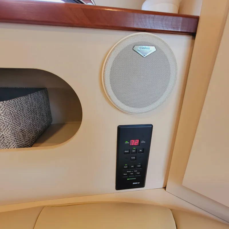 Slide: The Image of 1999 Cruisers Yachts 3075 Rogue interior with speaker and control panel. - 39