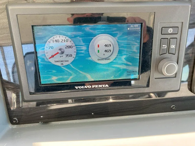 Slide: The Image of Volvo Penta display on 2016 Formula 37 PC, showing engine metrics and controls. - 23