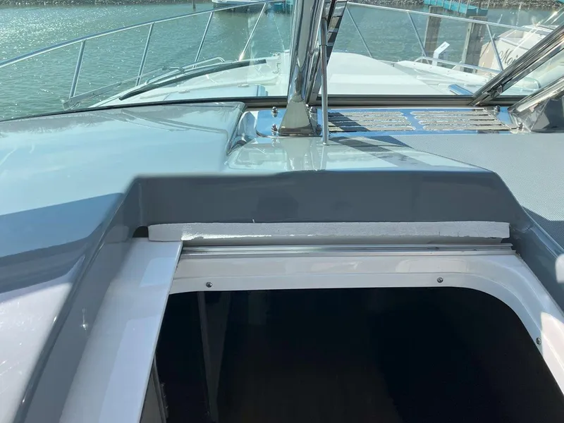 Slide: The Image of 2016 Formula 37 PC yacht deck with open cabin entrance. - 26
