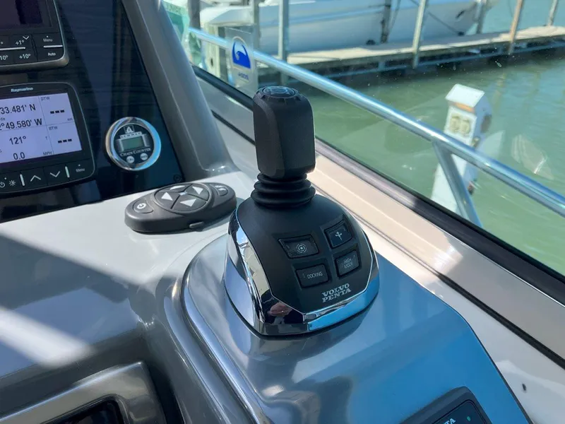 Slide: The Image of Joystick control on 2016 Formula 37 PC boat dashboard, docked at marina. - 30