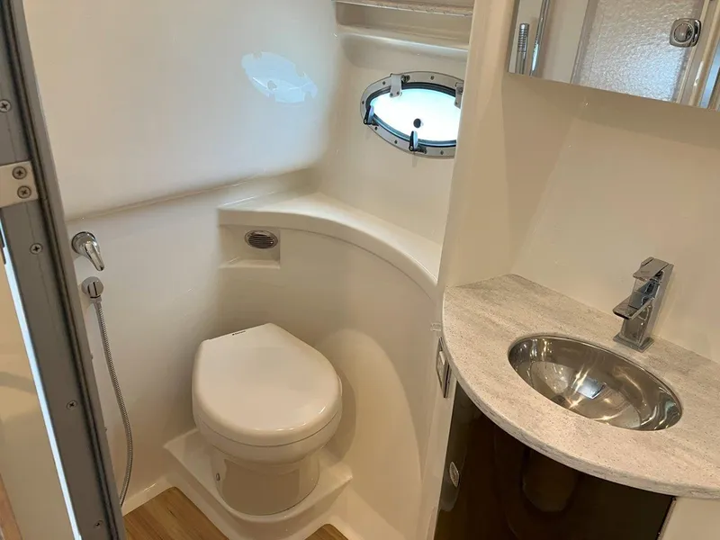 Slide: The Image of 2016 Formula 37 PC yacht bathroom with modern fixtures and porthole window. - 39