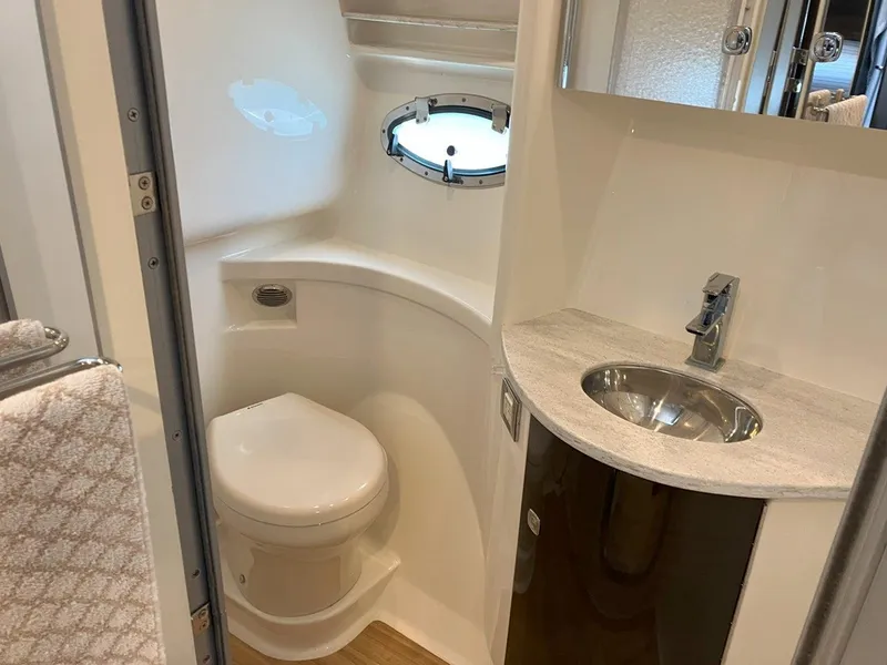 Slide: The Image of 2016 Formula 37 PC yacht bathroom with modern sink and compact toilet. - 40