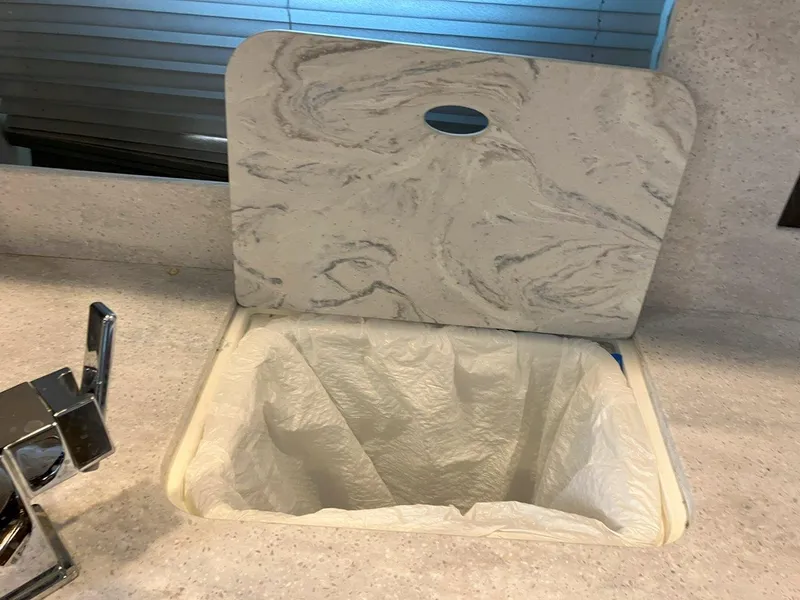 Slide: The Image of Marble-patterned countertop with integrated trash bin in 2016 Formula 37 PC yacht. - 46