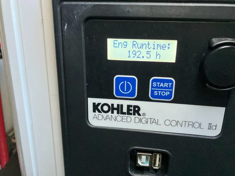 Slide: The Image of Kohler digital control panel displaying engine runtime of 192.5 hours. - 49