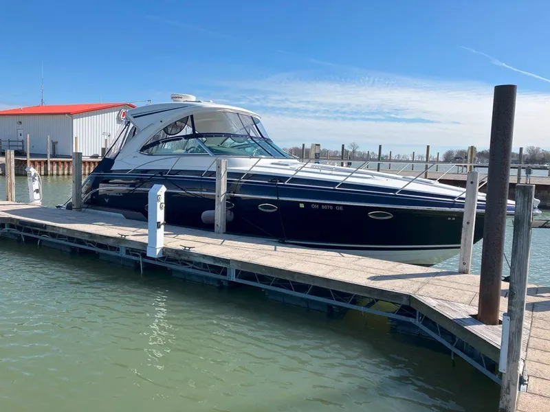 Slide: The Image of 2016 Formula 37 PC yacht docked at marina under clear blue sky. - 7