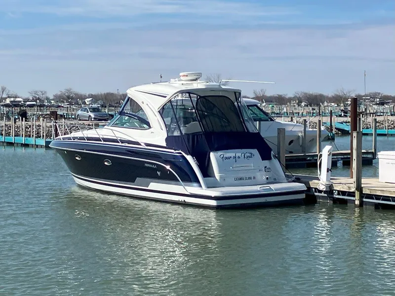 Slide: The Image of 2016 Formula 37 PC yacht docked in a marina on a sunny day. - 9