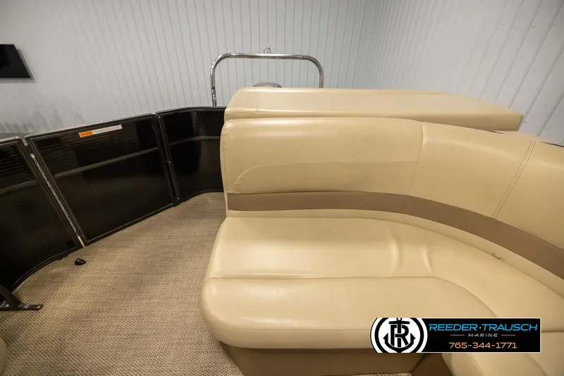 Slide: The Image of 2017 Crest 200 L CPT pontoon boat with beige seating and carpeted floor. - 15