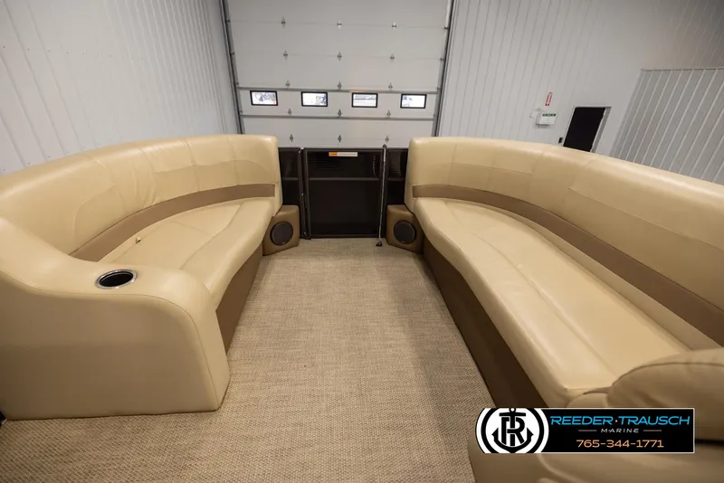 Slide: The Image of Interior of a 2017 Crest 200 L CPT pontoon boat with beige seating. - 18
