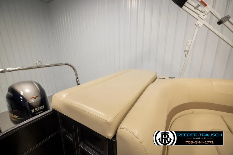 Slide: The Image of 2017 Crest 200 L CPT pontoon boat interior with Yamaha 150 engine, beige seating. - 23