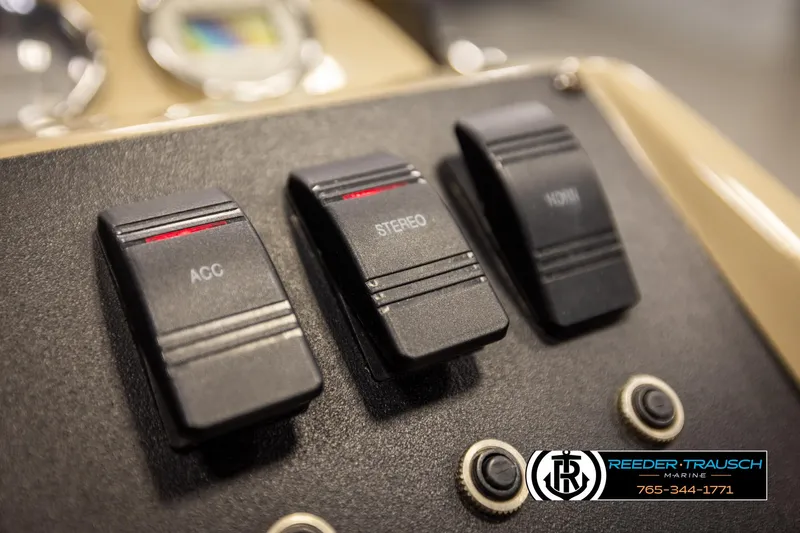 Slide: The Image of Control panel of 2017 Crest 200 L CPT boat with switches labeled ACC, Stereo, and Horn. - 33