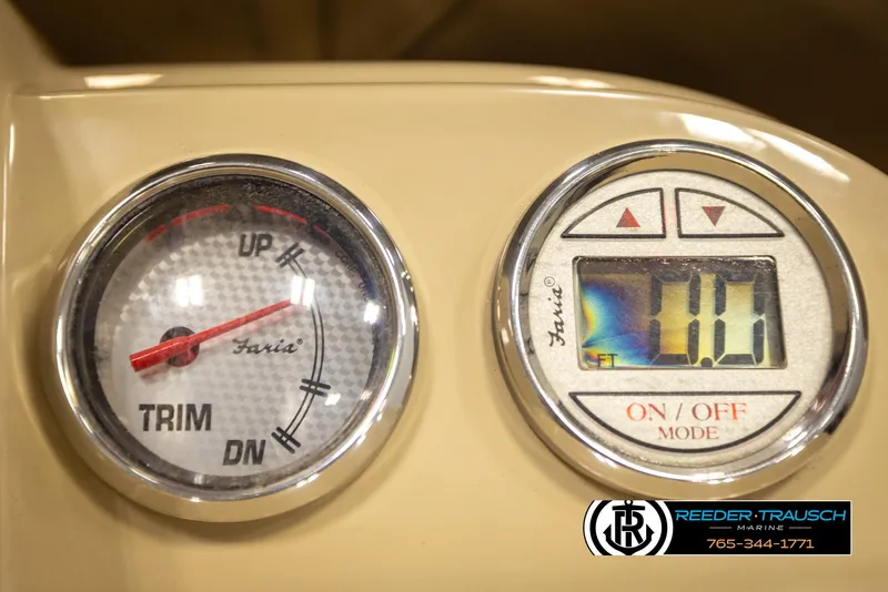 Slide: The Image of Control panel of a 2017 Crest 200 L CPT boat with trim gauge and digital display. - 34