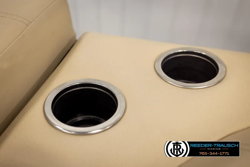 Slide: The Image of Cup holders on a 2017 Crest 200 L CPT boat, beige interior. - 39