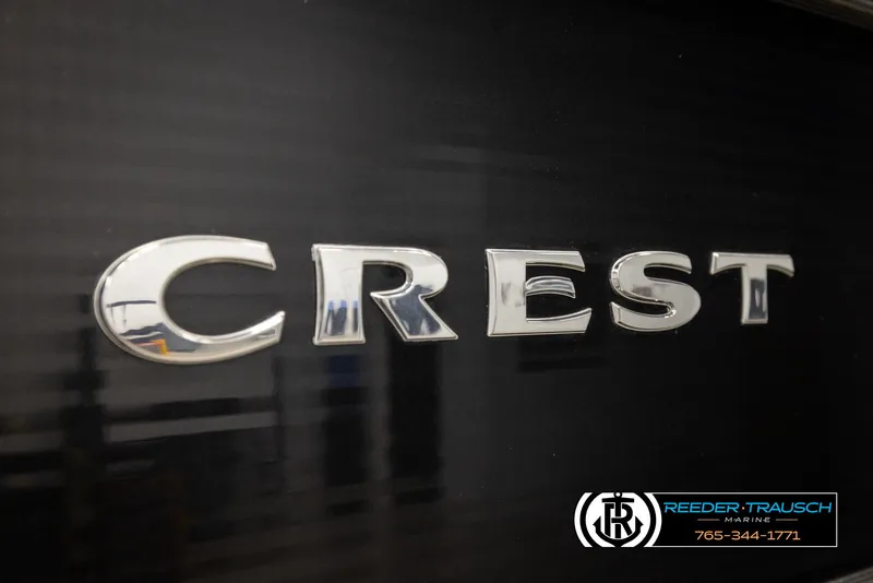 Slide: The Image of Chrome "Crest" logo on a 2017 Crest 200 L CPT boat. - 43