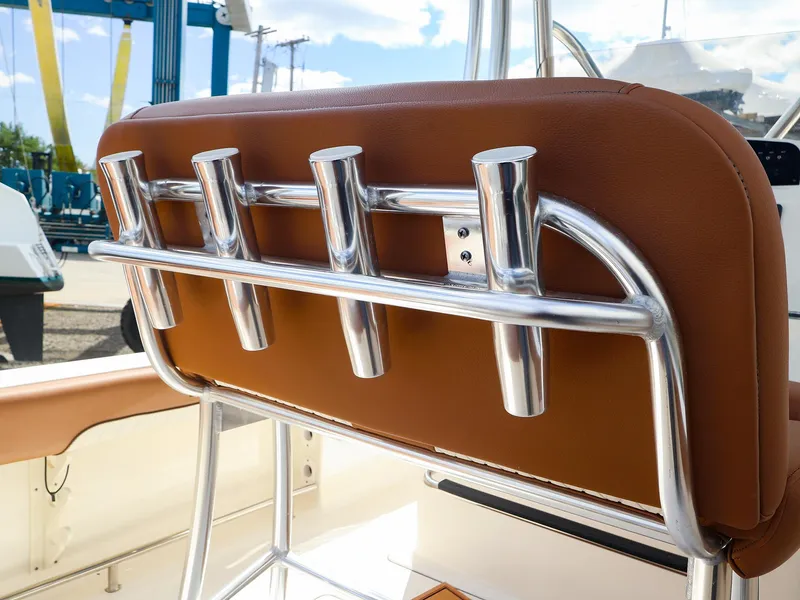 Slide: The Image of 2022 Pioneer 222 Islander boat seat with stainless steel rod holders. - 12