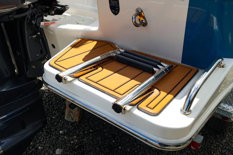 Slide: The Image of 2022 Pioneer 222 Islander boat swim platform with foldable ladder and non-slip mat. - 15