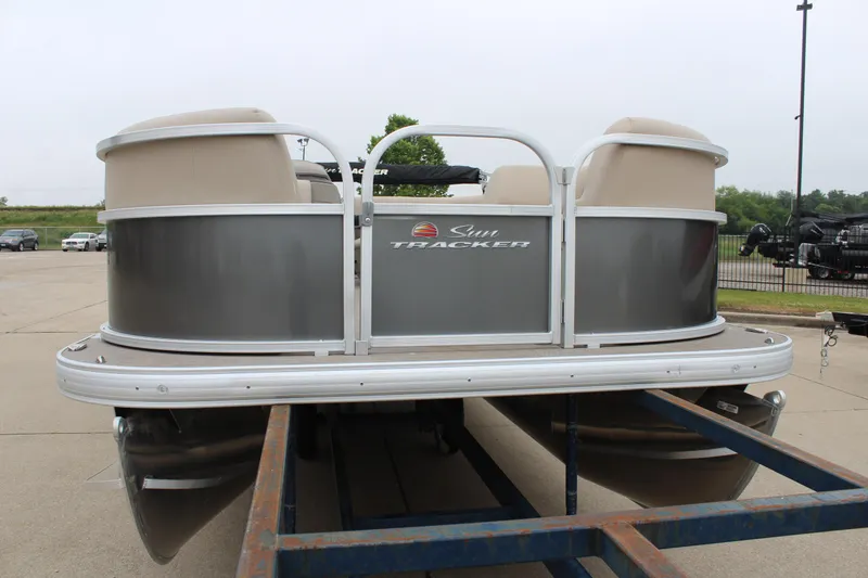Slide: The Image of 2025 Sun Tracker Party Barge 18 DLX pontoon boat on trailer. - 6