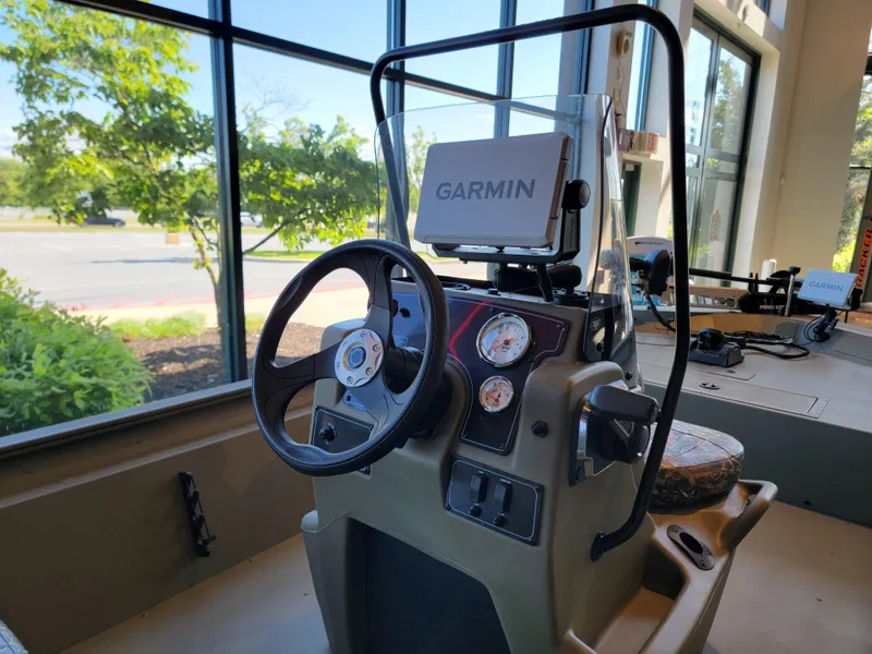 Slide: The Image of 2025 Tracker Grizzly 1860 CC boat console with Garmin navigation system. - 3