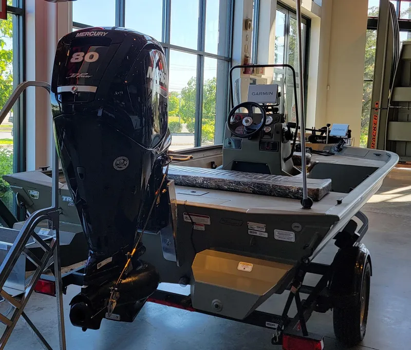 Slide: The Image of 2025 Tracker Grizzly 1860 CC boat with Mercury 80 engine in showroom. - 5