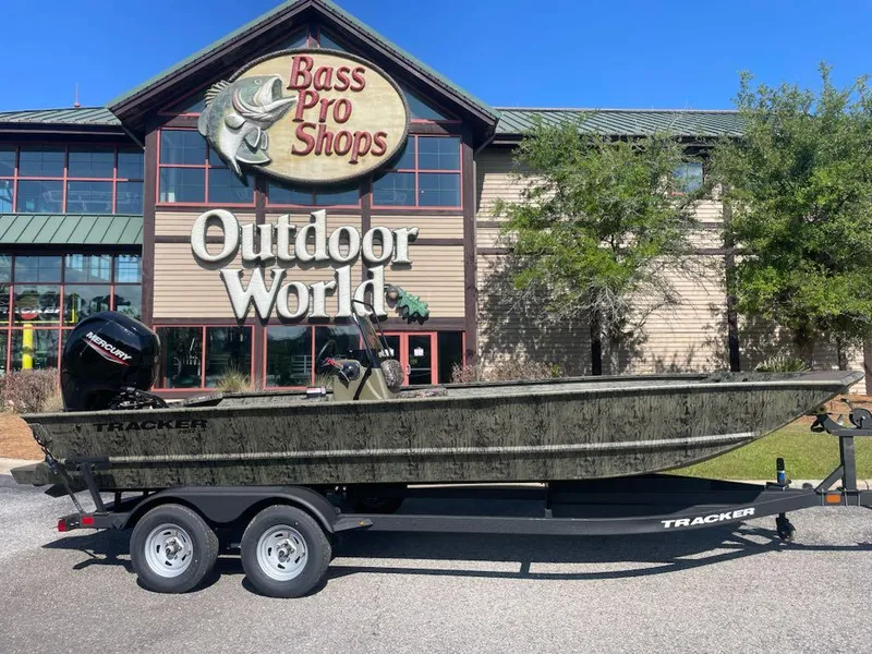 Slide: The Image of 2025 Tracker Grizzly 2072 CC boat outside Bass Pro Shops Outdoor World. - 3