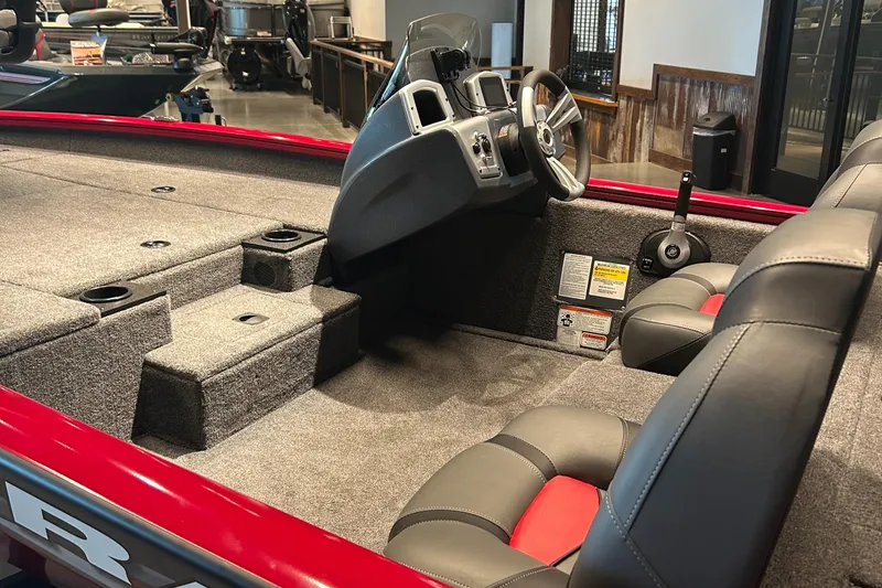 Slide: The Image of 2025 Tracker Pro Team 190 boat interior with steering console and seating. - 3