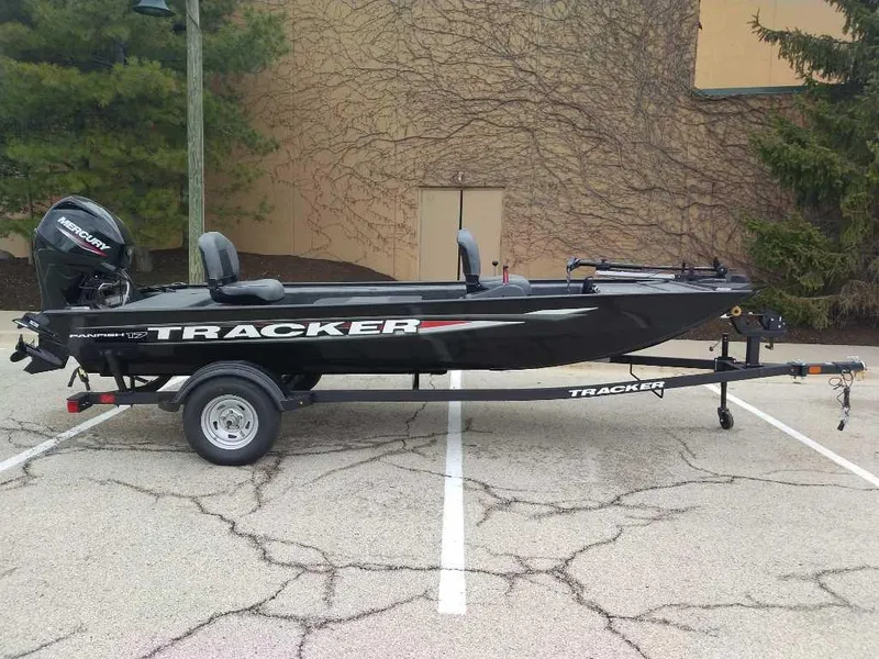 The Image of 2025 Tracker Panfish 17 boat on trailer, parked in a lot. - 0