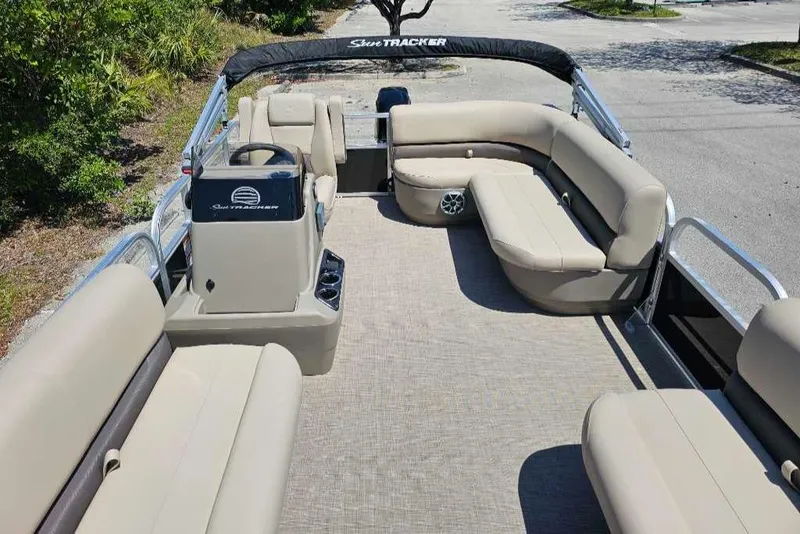 Slide: The Image of 2025 Sun Tracker Party Barge 16 DLX pontoon boat with spacious seating and modern design. - 5