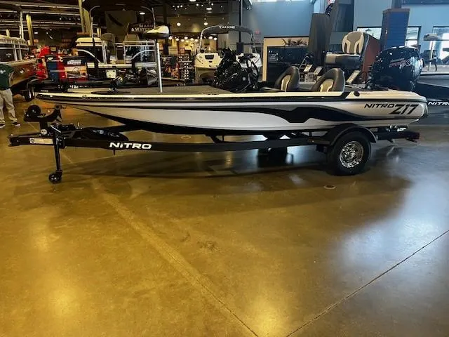 Slide: The Image of 2025 Nitro Z17 boat displayed in showroom, side view. - 1