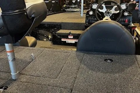Slide: The Image of 2025 Nitro Z17 boat interior with steering wheel and seating area. - 4