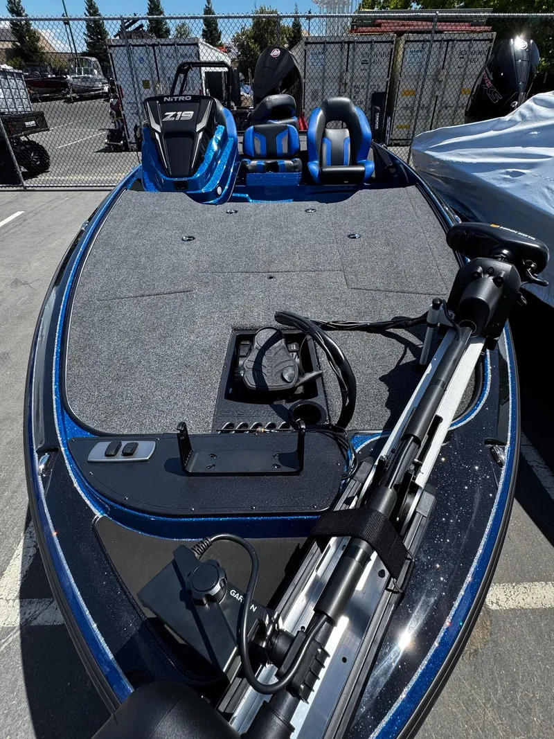Slide: The Image of 2025 Nitro Z19 Pro fishing boat with dual seats and advanced trolling motor. - 3