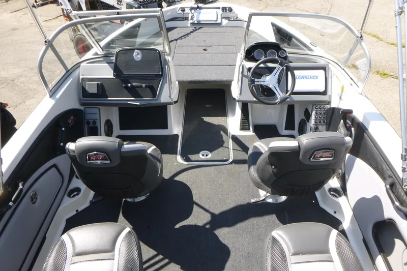 Slide: The Image of 2024 Ranger 1850MS boat interior with dual consoles and modern dashboard. - 6