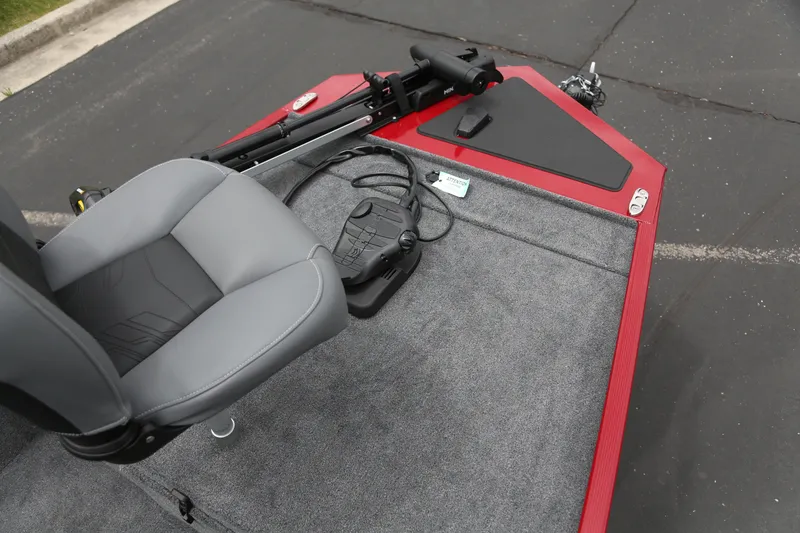 Slide: The Image of 2025 Tracker Bass Tracker Classic XL boat deck with seat and trolling motor. - 3