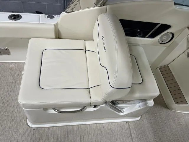Slide: The Image of 2023 Chris-Craft Calypso 24 boat seat with cream upholstery and elegant design. - 23