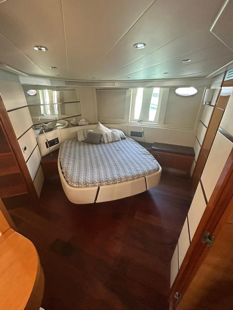 Slide: The Image of Luxurious bedroom interior of 2007 Pershing 62' yacht with elegant design and cozy bed. - 11
