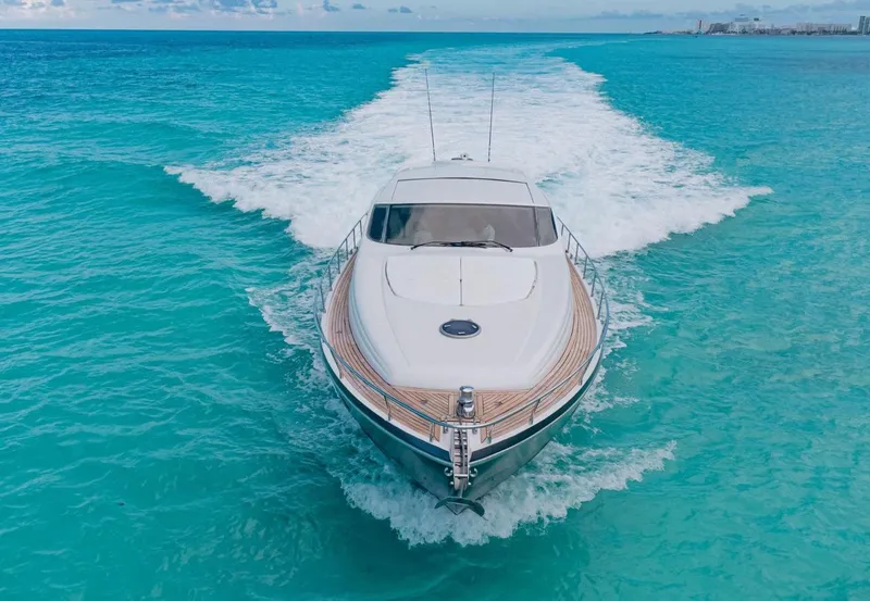 Slide: The Image of 2007 Pershing 62' yacht cruising on turquoise ocean waters. - 3