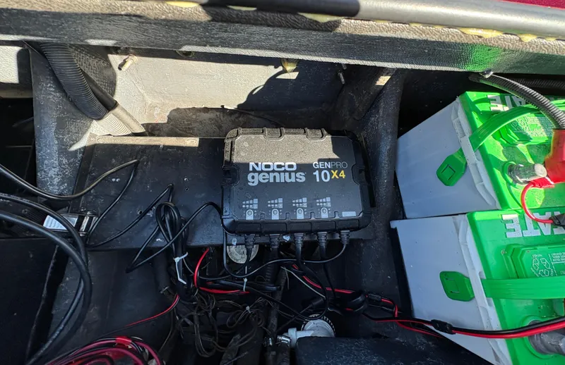 Slide: The Image of 2007 Triton Tr-186 SC boat with NOCO Genius GENPRO10X4 battery charger and batteries. - 23