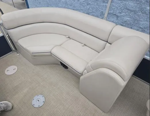 Slide: The Image of Luxurious seating on 2018 South Bay 222RS pontoon boat with beige upholstery. - 9