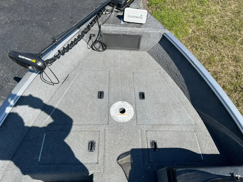 Slide: The Image of 2017 Lund 1750 Rebel XS SS boat deck with Garmin equipment and trolling motor. - 20