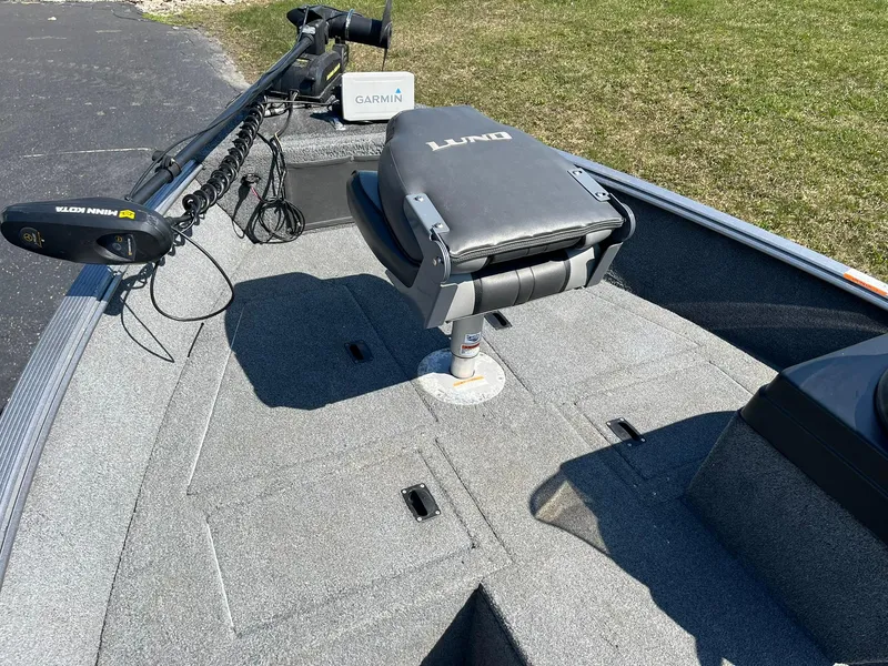 Slide: The Image of 2017 Lund 1750 Rebel XS SS boat deck with Garmin equipment and swivel seat. - 22