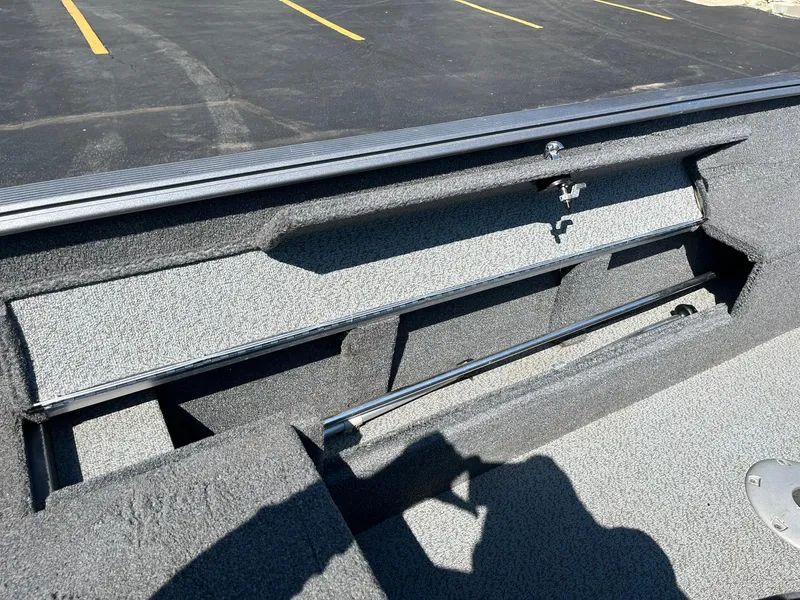 Slide: The Image of 2017 Lund 1750 Rebel XS SS boat interior storage compartment. - 23