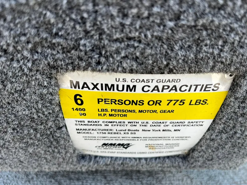 Slide: The Image of 2017 Lund 1750 Rebel XS SS capacity label, 6 persons or 775 lbs, U.S. Coast Guard compliant. - 27
