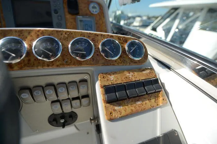 Slide: The Image of Dashboard of a 2007 Formula 34 PC boat with gauges and switches. - 11