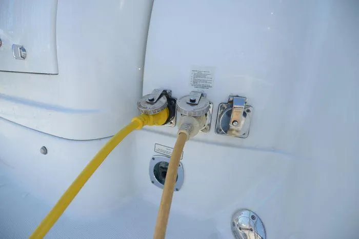 Slide: The Image of Power and water connections on a 2007 Formula 34 PC boat. - 16