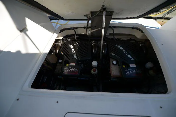 Slide: The Image of Engine compartment of a 2007 Formula 34 PC boat with dual Mercury engines. - 36