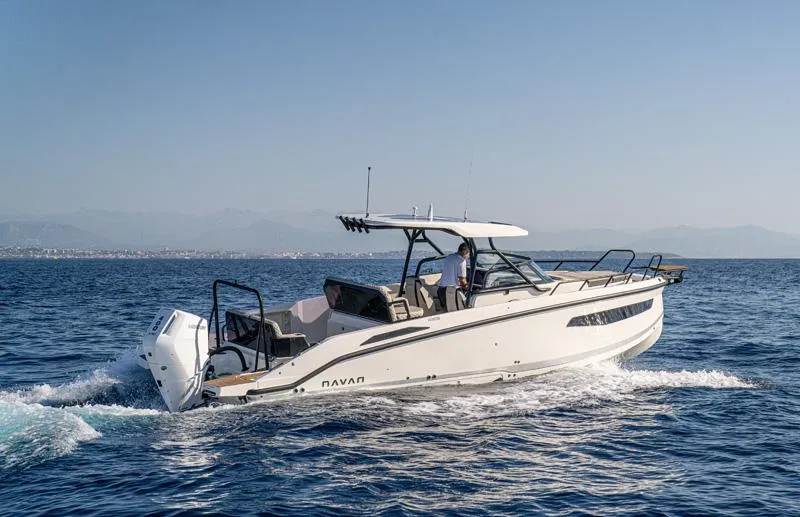 The Image of Navan S30 2025 boat cruising on open water under clear blue sky. - 0